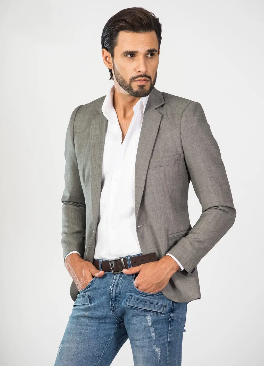 Man in Gray Suit Jacket and Blue Denim skinny Jeans