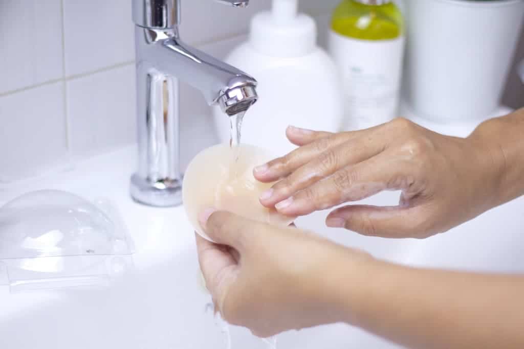 Washing silicone sticker pad to cover nipples in the bathroom