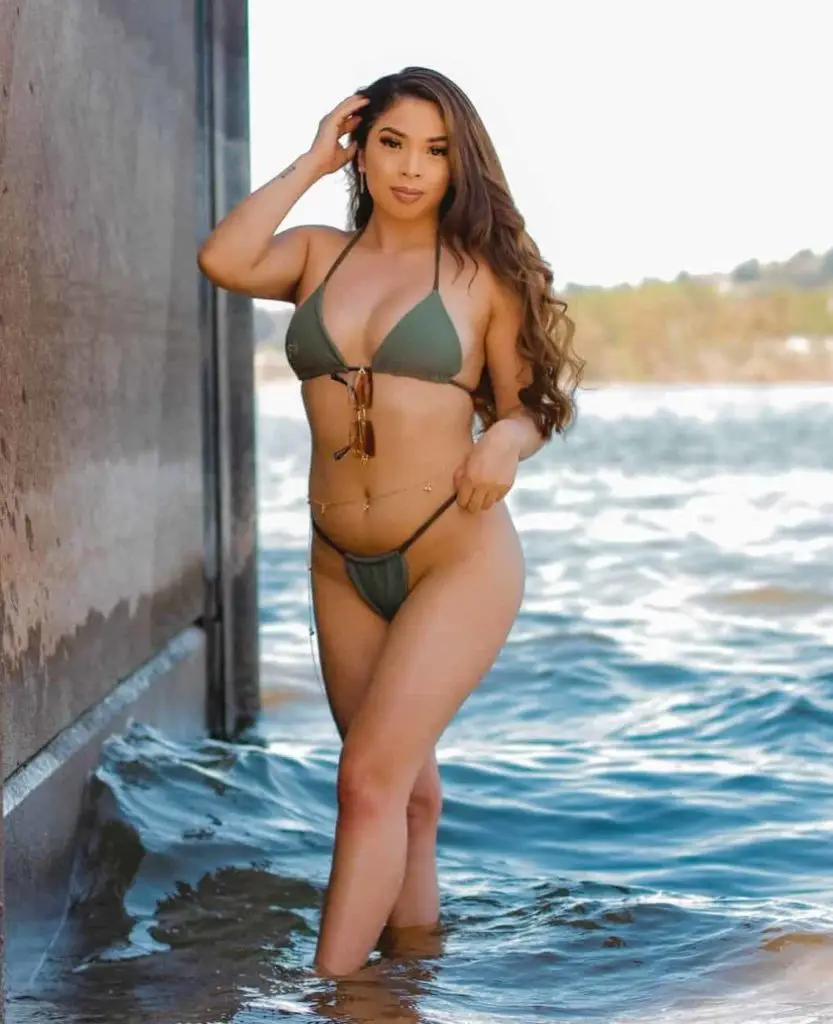 a-woman-in-Tarzan Bikini-standing-on-water